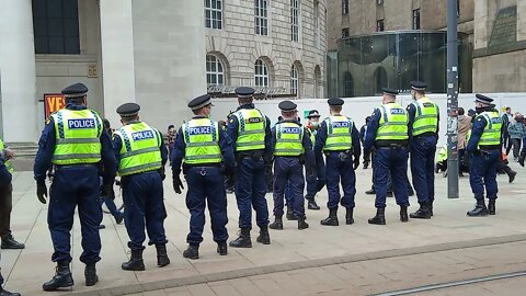 Manchester riot police remove protesters on tram lines