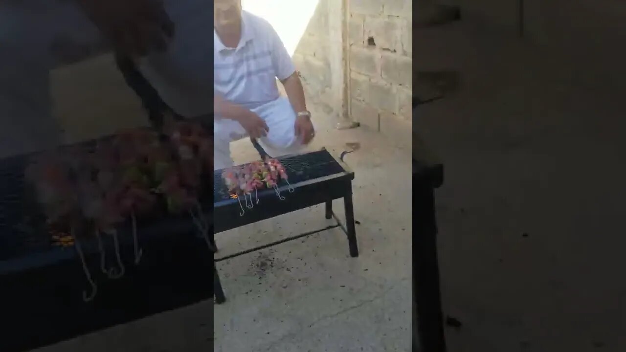 Cooking barbecue in Ouled Djellal, Algeria