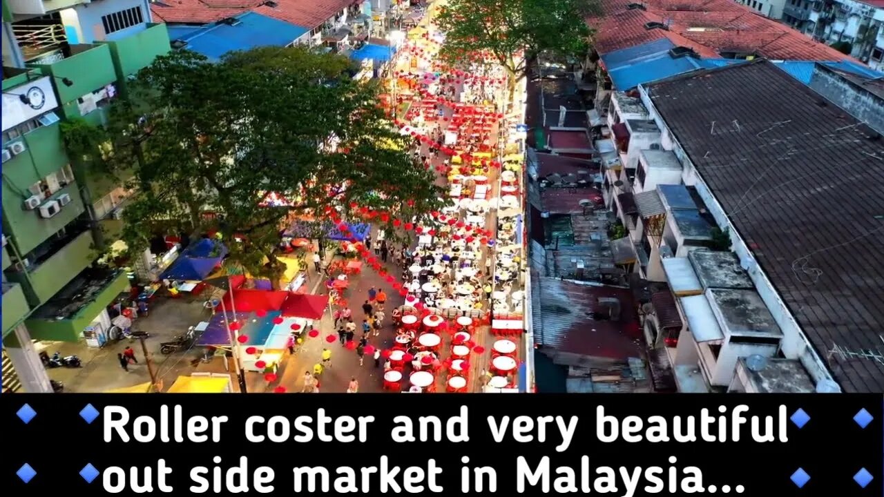 Malaysia out side market and rolar coster amazing video.
