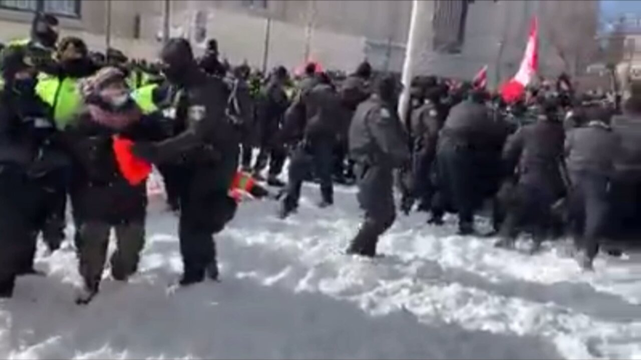 Ottawa police arresting a elderly man