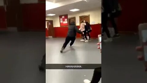 Lad Slide Tackles Girl Accross Slippy Floor