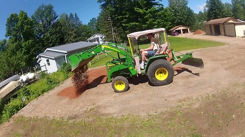 #168 John Deere Spreading Crushed Gravel For Storage Building