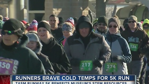 Single-digit temps don't stop Runway 5K runners