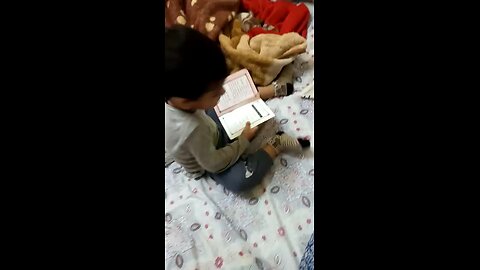 wahaj reading aa book