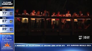 Candlelight vigil honors 9/11 victims and 13 soldiers killed in Kabul airport bombing