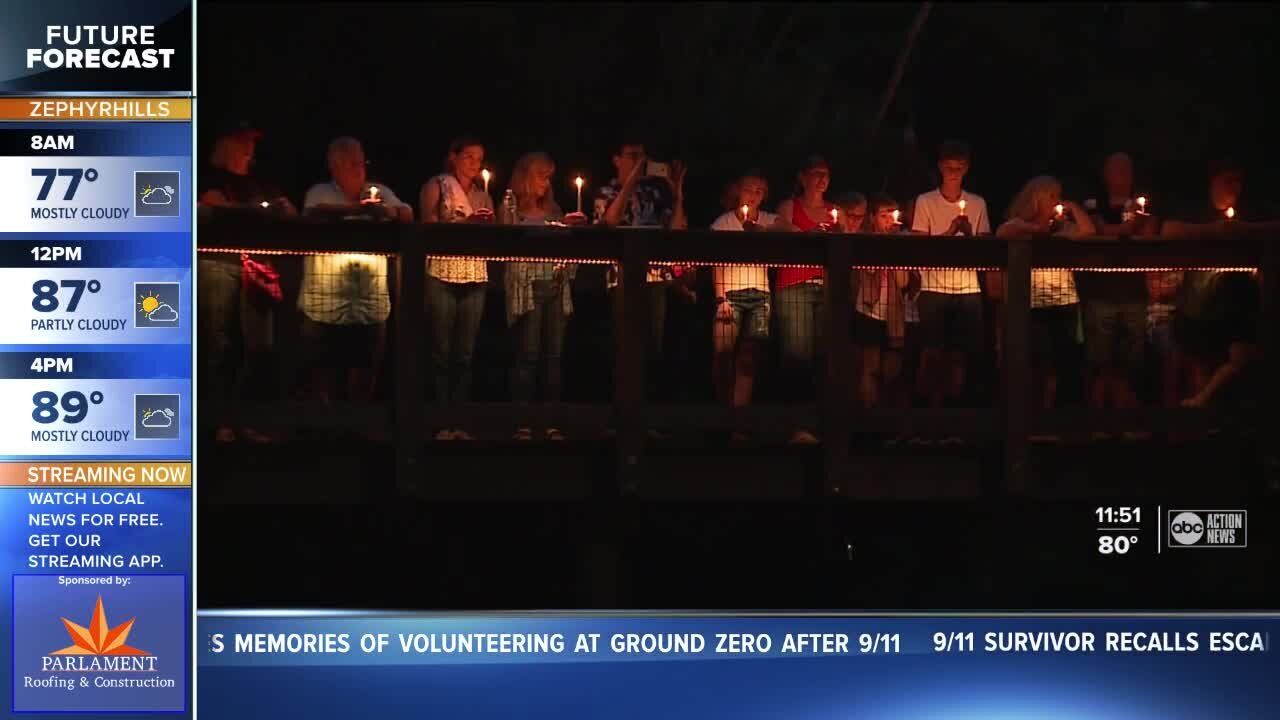 Candlelight vigil honors 9/11 victims and 13 soldiers killed in Kabul airport bombing