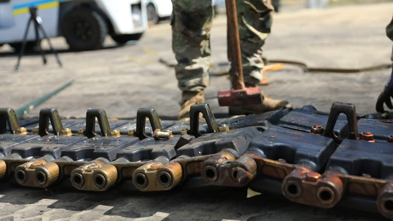 maintenance on a U.S. M1A2 Abrams tank