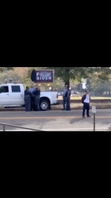 Instant Karma For Man Taking Down "F*** Biden" Sign