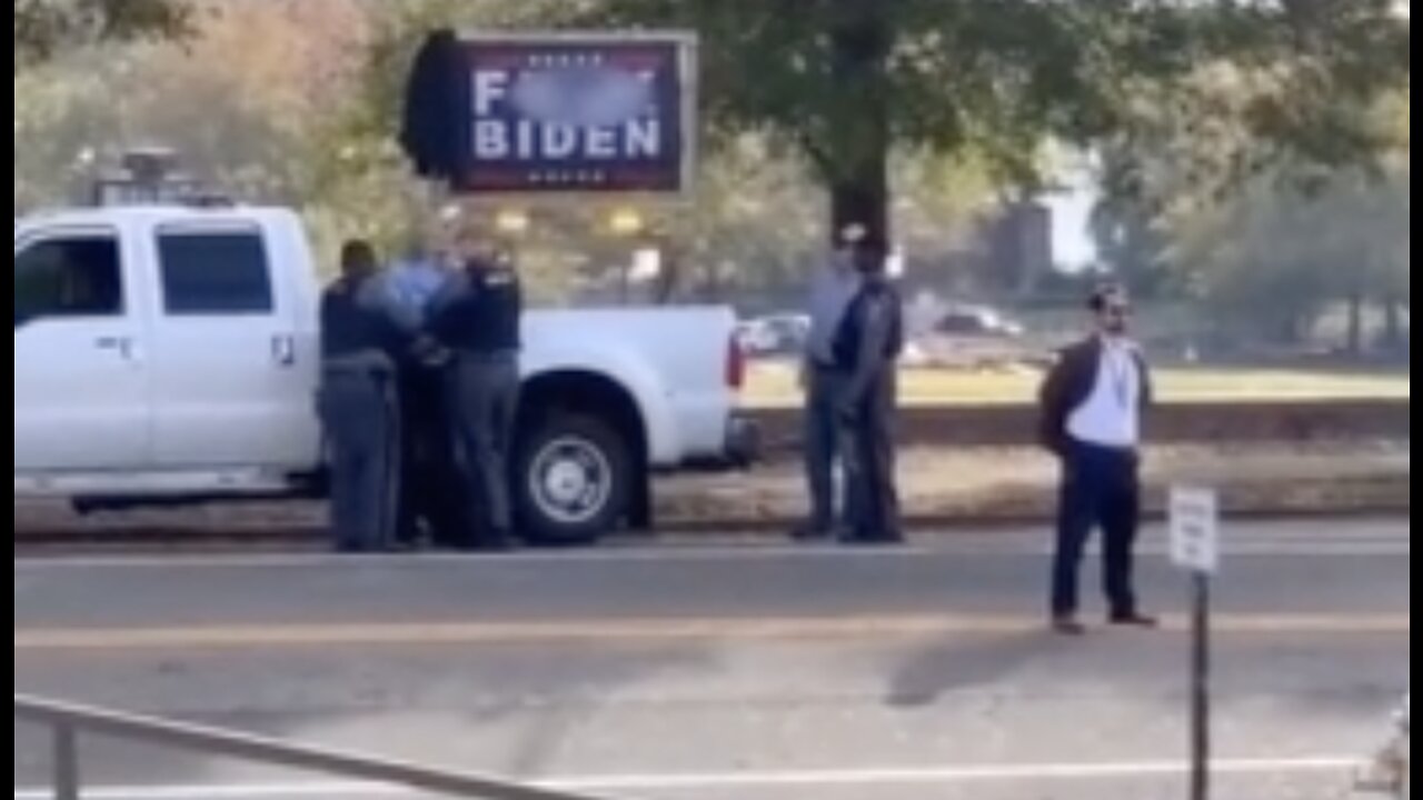 Instant Karma For Man Taking Down "F*** Biden" Sign