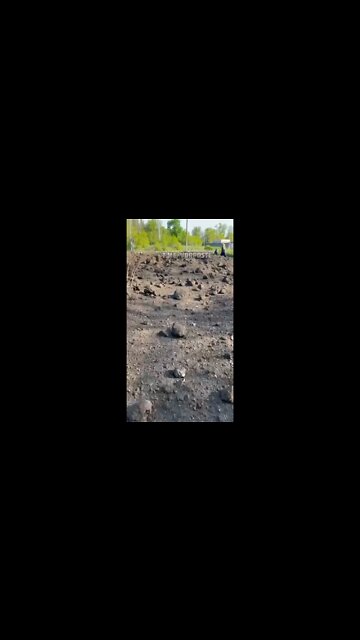 A large crater from a strike near Slavyansk, DNR. Most likely the target was the railroad tracks.