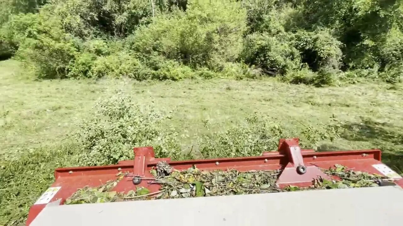 Ventrac 4500Y diesel with tough cut finishing mowing a trail and small field.