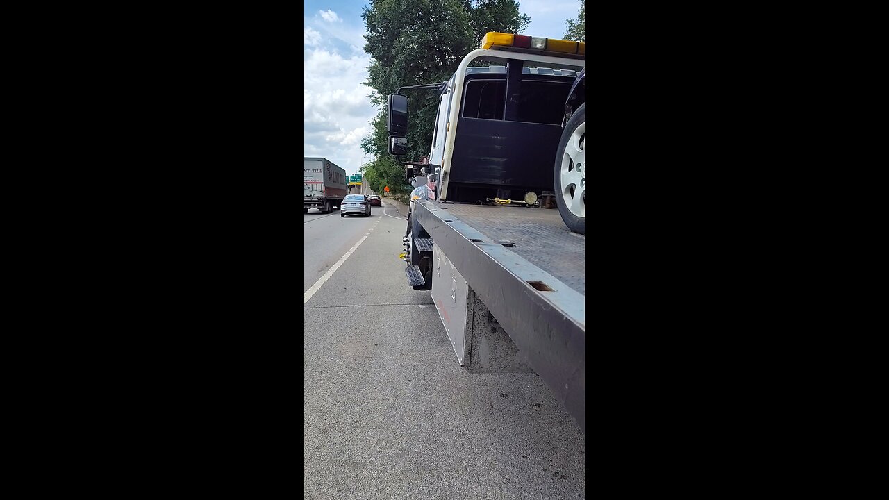 O what a day, O what a lovely day! towing a tow truck