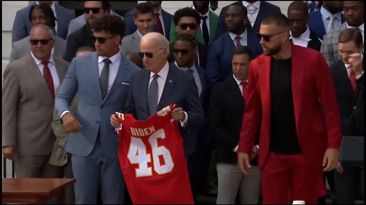 Kansas City Chiefs Tight End Tells Biden To Stay and Takes Podium