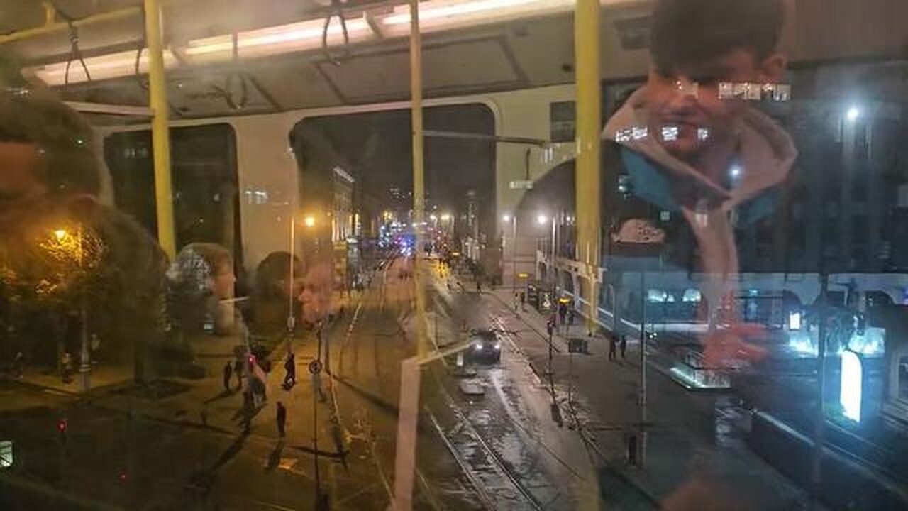 People Forced Onto Trains Away from the Rioting in Dublin, Ireland