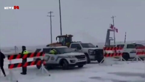 Break through a police barricade near Katz, Canada | NEWS-19