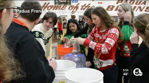 Local school raises money in annual Christmas for Others Coin Wars Competition