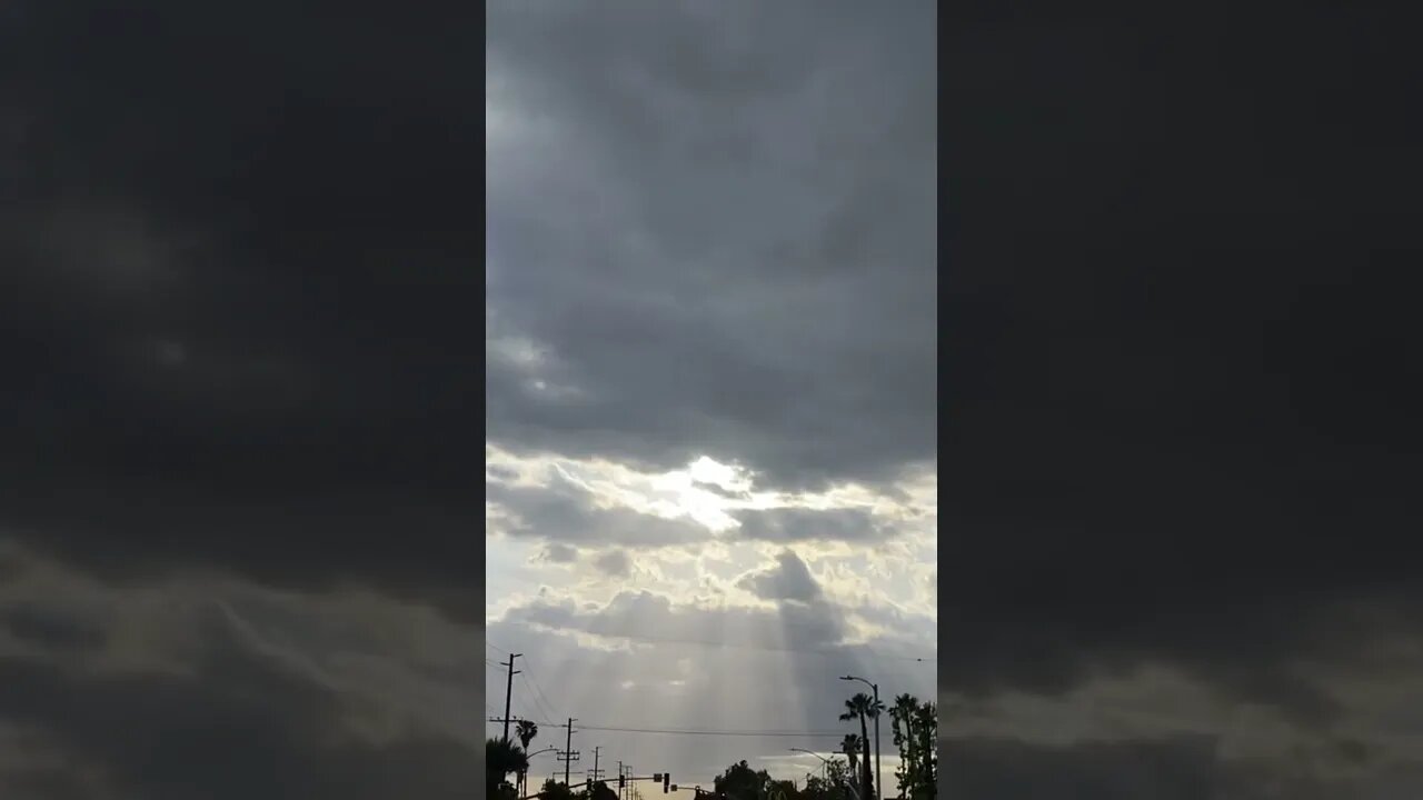 Sun Streaking Through The Clouds