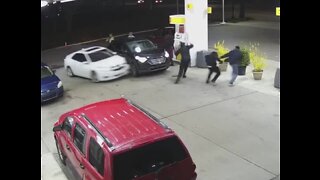 Surveillance shows wild altercation at gas station in Van Buren Township