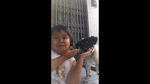 Cute baby and dog