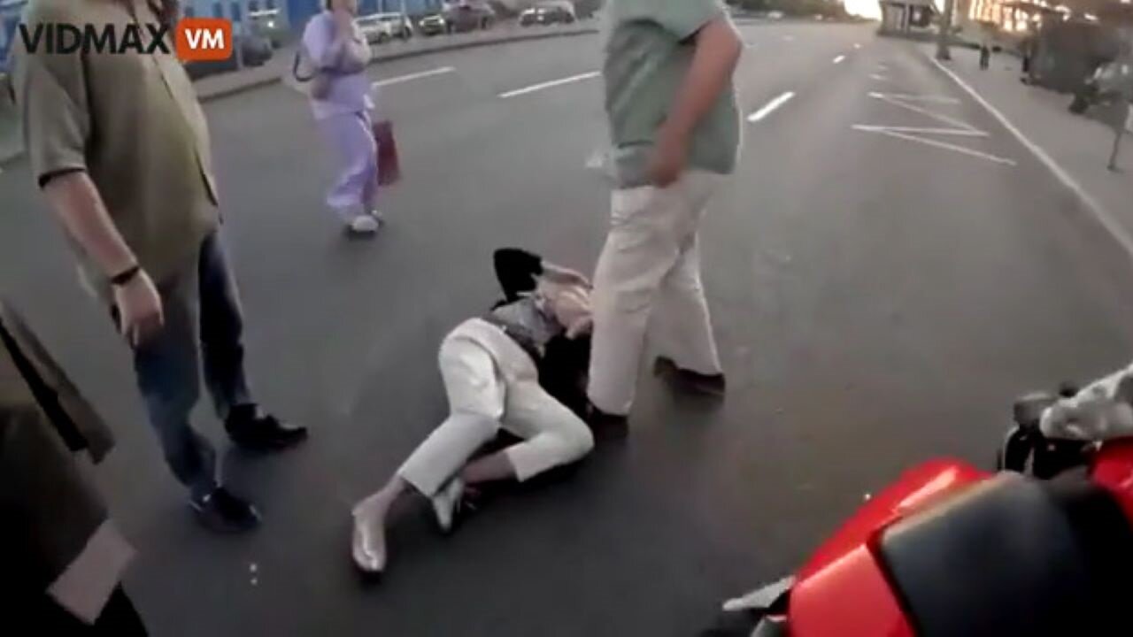 Speeding Bikers Run Through A Red Light, Hitting A Lady On The Crosswalk, Other Citizens Go At Them