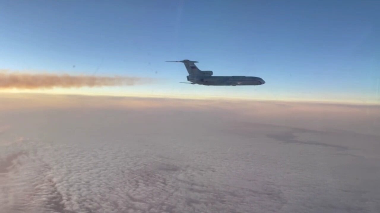 Sukhoi Su-30SM fighters escorts a Tupolev Tu-154 of the Special Flight Detachment "Rossjia"