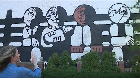 Iconic 1969 Cleveland mural of 4 diverse faces gets facelift this fall