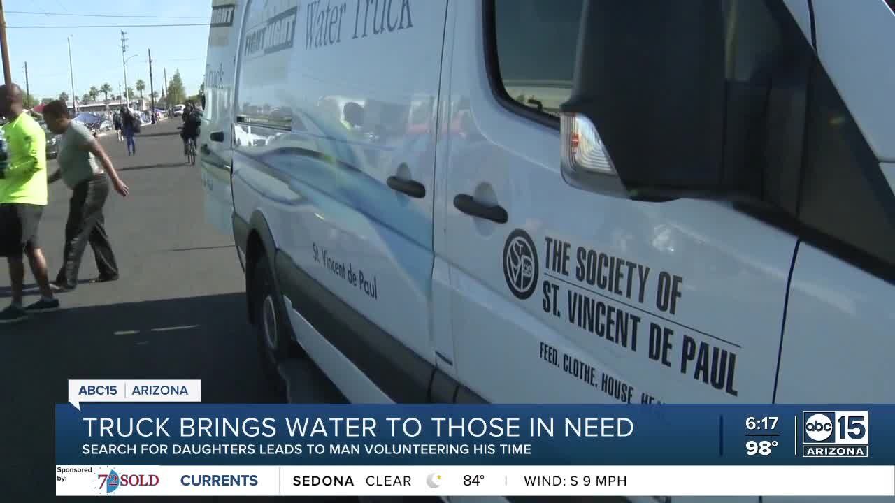 Volunteer truck brings water to those in need