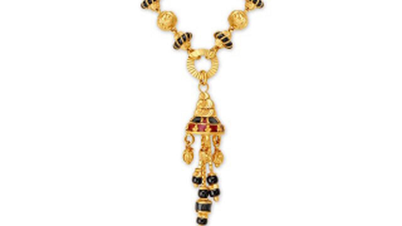 short gold mangalsutra design.