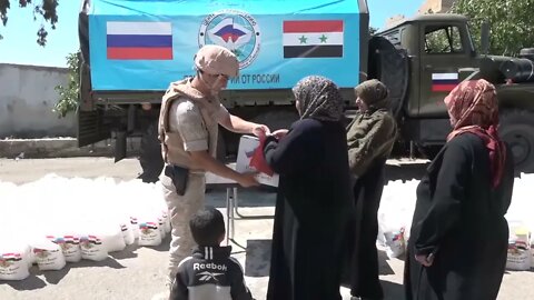 Russian Troops From The Centre Of Reconciliation In Syria Handed Out Humanitarian Aid In Bir Ajam