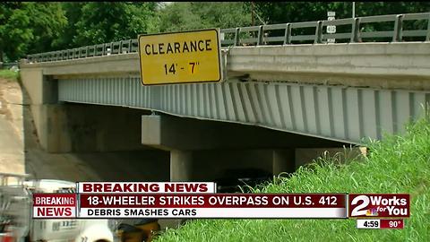 18-Wheeler strikes overpass on Crosstown Expy.