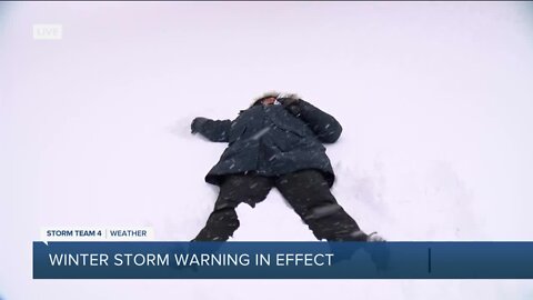 Elaine enjoys the snow falling in Southeast Wisconsin