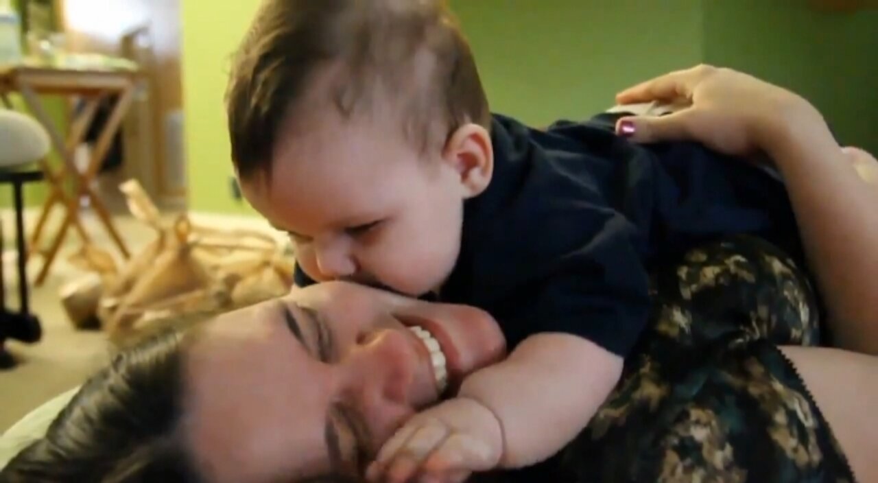 ￼ Cute Baby Eats Mamas Nose