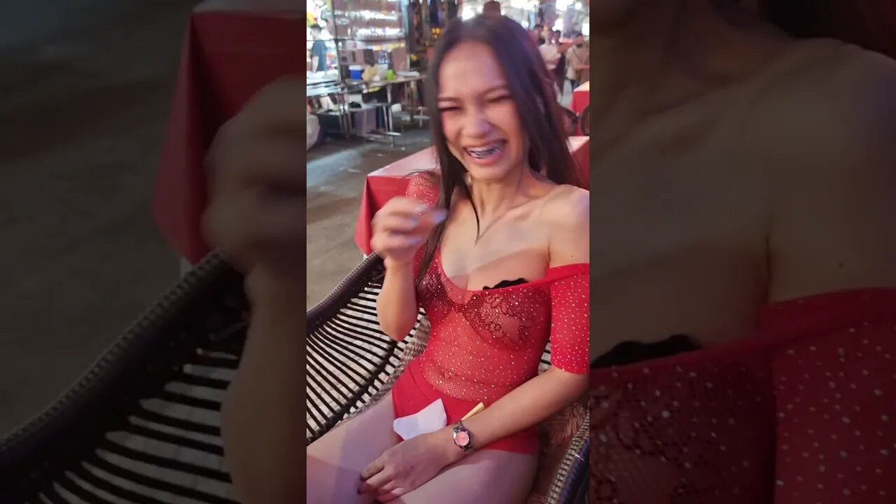 Thai gogo dancer cleans her nose