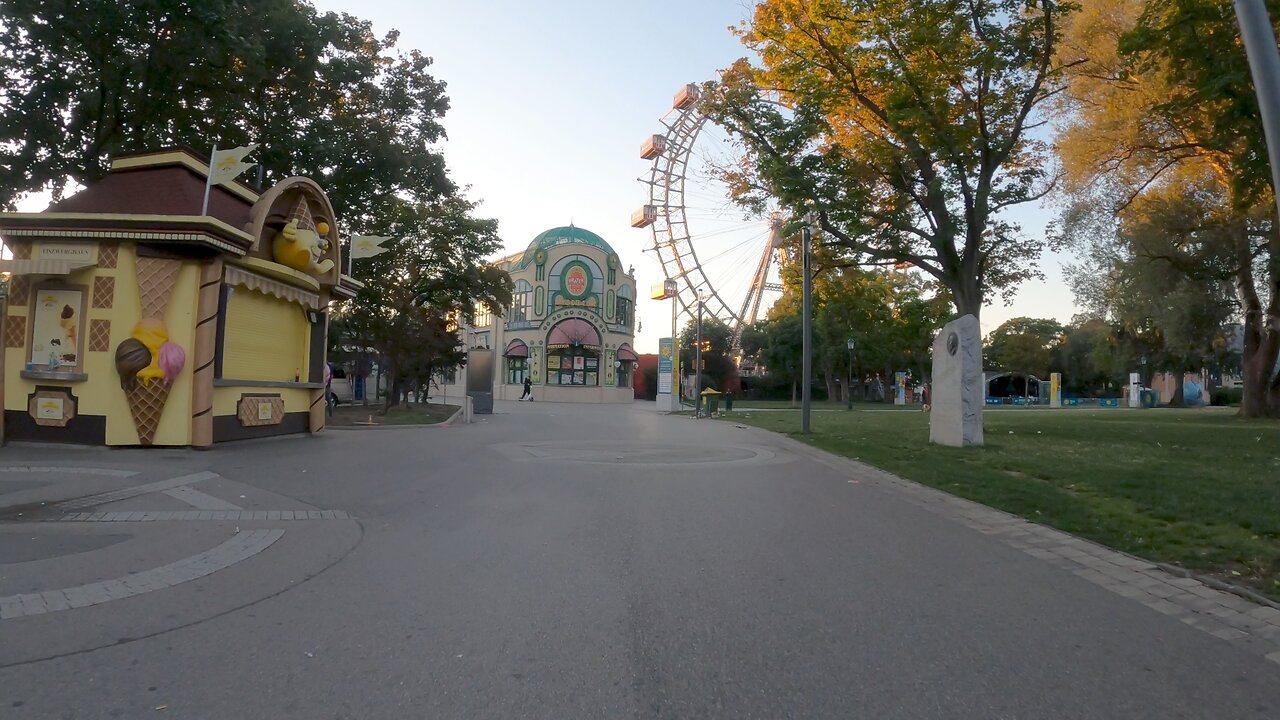 Cycling through Vienna's popular Wurstelprater after sunrise