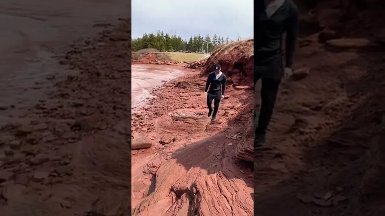Jason Dunn walking along a beach 🏖