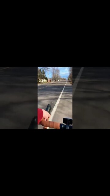 First person biking through town