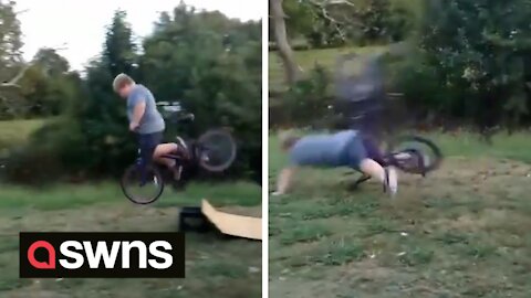 Watch the moment a boy is sent flying over his handlebars after a ramp snaps
