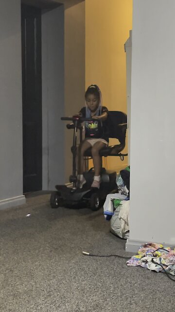 4YR OLD RELAYING MESSAGE ON SCOOTER