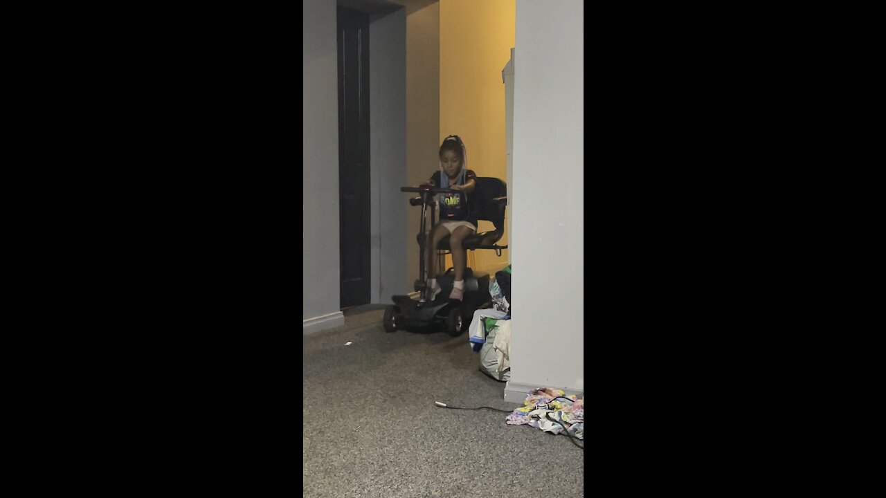 4YR OLD RELAYING MESSAGE ON SCOOTER