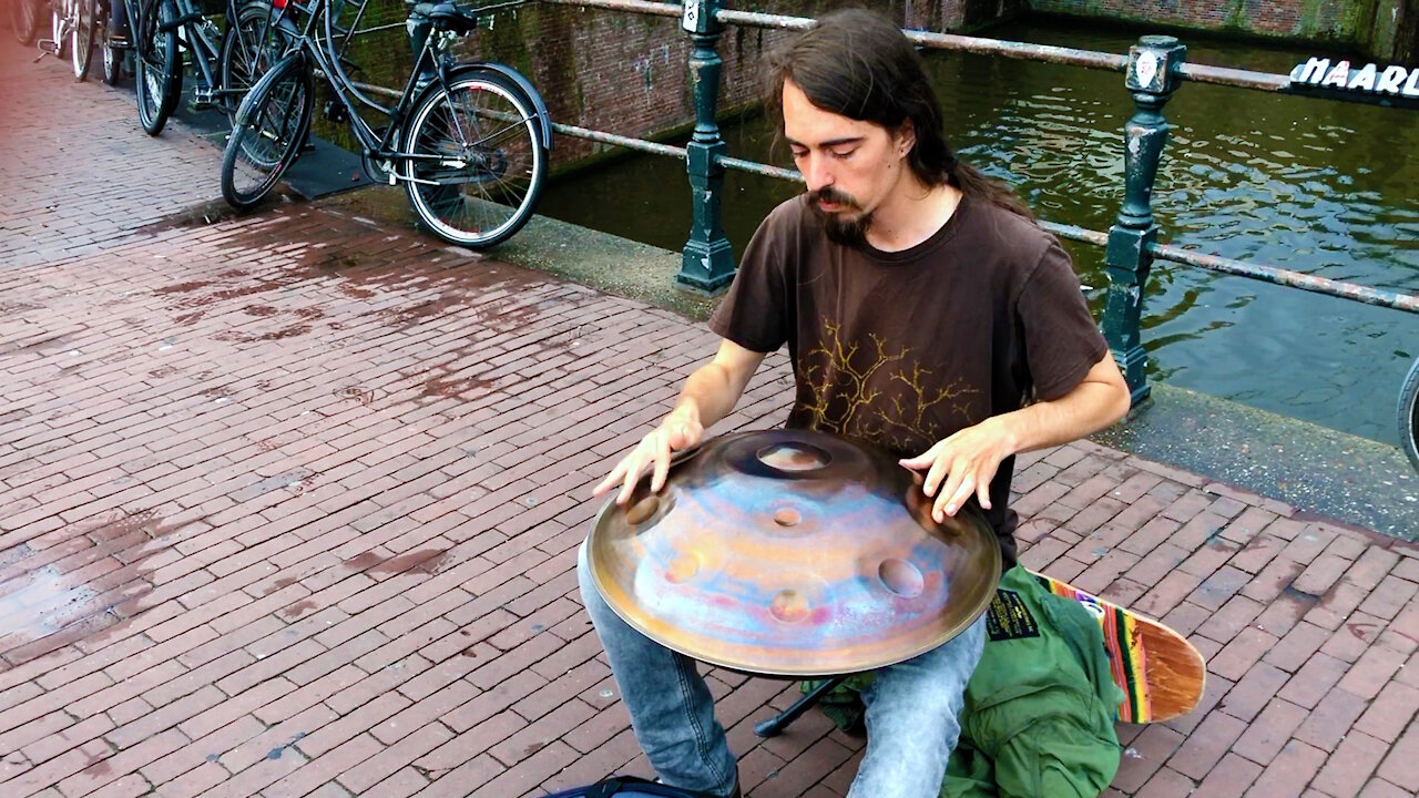 Amsterdam Street Musician plays ‘Hang drum'