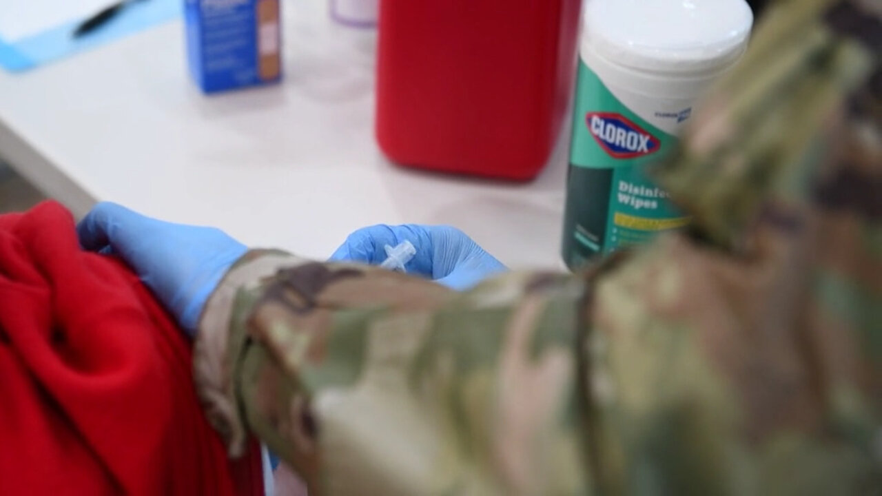 Washington National Guard administers the vaccine to elderly members of the public