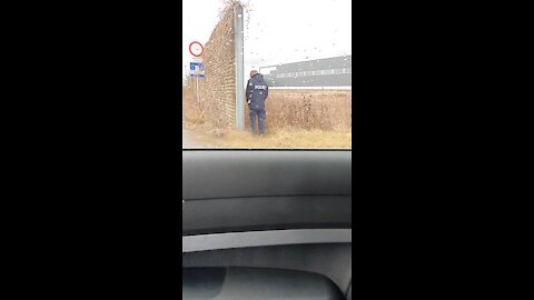 Austrian Police Officer Having a Piss