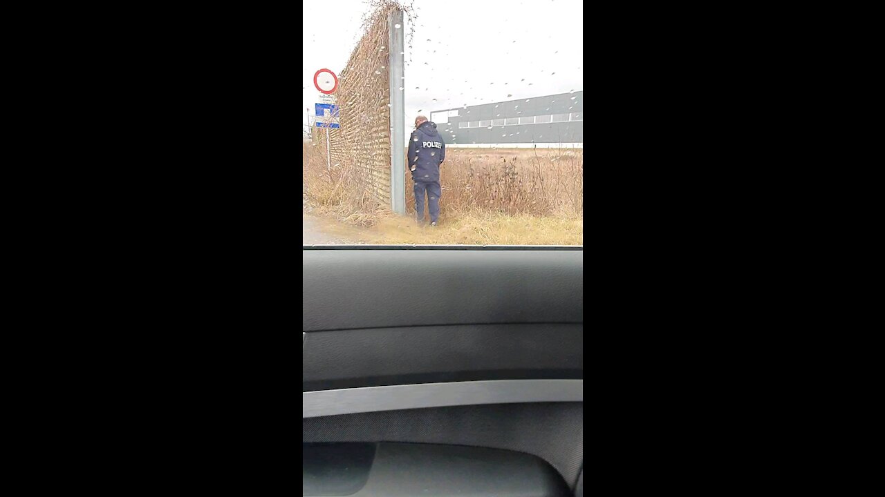 Austrian Police Officer Having a Piss