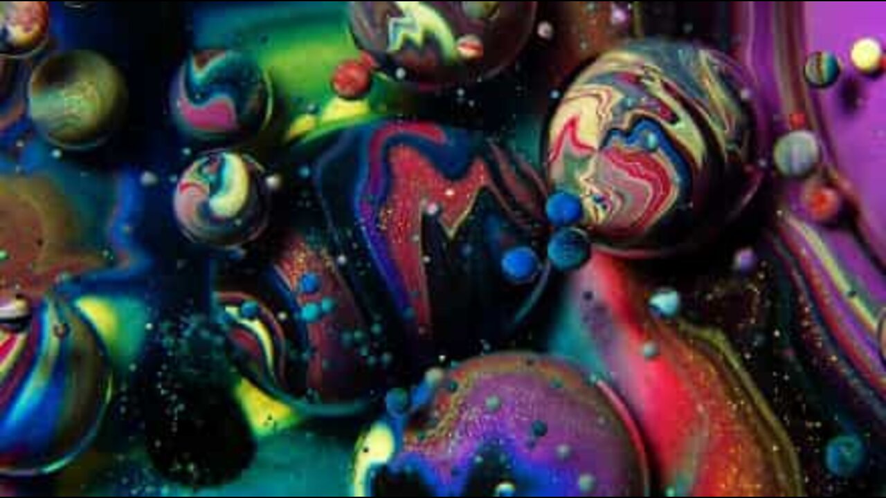 A psychedelic mixture of oil, soap, and paint