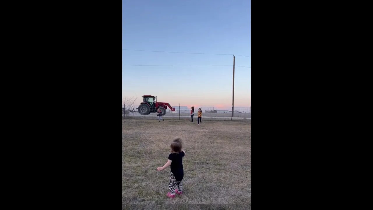 Grand kids waving at me as I drive by...