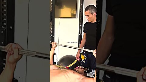 Andrew Tate doing bench press