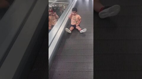 Escalator. Baby shows no fear 🥰🤪. #viral #shorts #cute