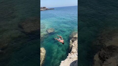 Nice front to backflip SlowMo cliff jumping in greece