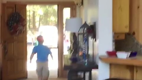 Boy Runs Down Hall and Through Screen Door