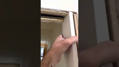 Pocket door trim stop notched for clean look